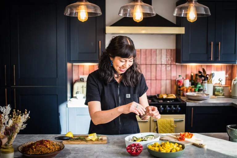 Kate preparing food smiling