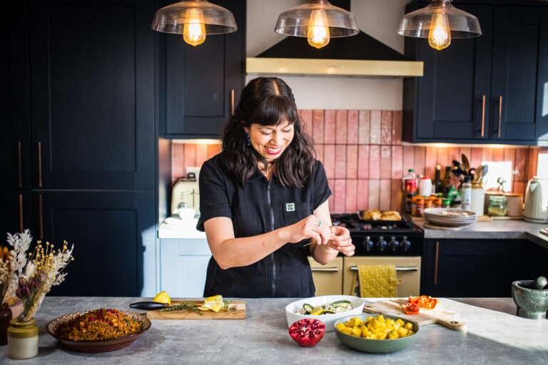 Kate preparing food smiling