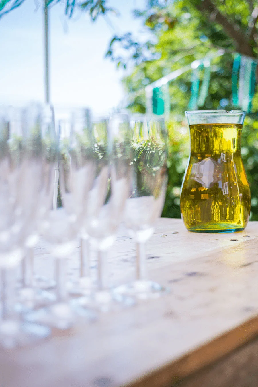 Champagne glasses on a table, set up by The Shared Table's wedding catering service
